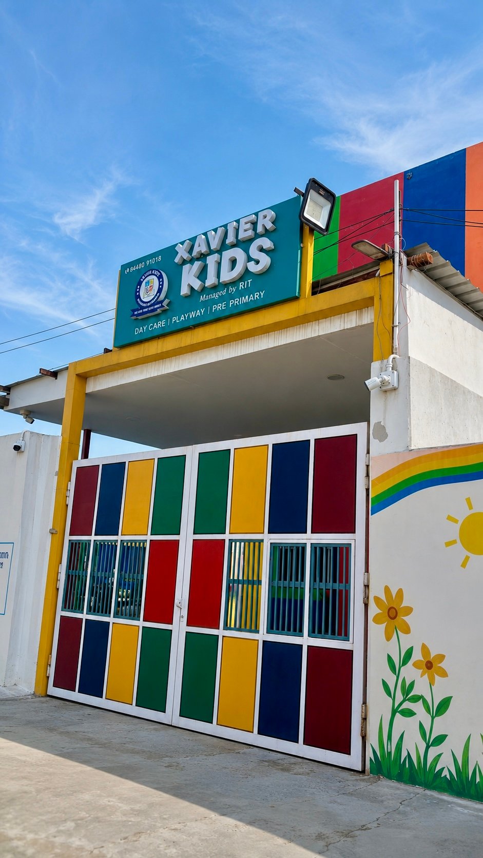 Happy students learning and playing at Xavier Kids School